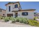 Charming two-story home features desert landscaping and a welcoming front entrance at 2540 N 148Th Dr, Goodyear, AZ 85395