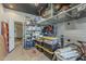 Garage showcasing shelving, storage racks, and ample space for a variety of household items at 2540 N 148Th Dr, Goodyear, AZ 85395