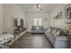 Cozy living room features stylish gray couches and modern decor at 2540 N 148Th Dr, Goodyear, AZ 85395
