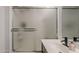 Bathroom showcasing a clean, bright shower stall with sliding glass doors and a handheld sprayer at 2540 N 148Th Dr, Goodyear, AZ 85395