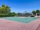 Community basketball court, fenced in, offering a green playing surface for outdoor recreation at 2635 N El Dorado Pl, Chandler, AZ 85224