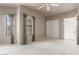 Spacious bedroom featuring a ceiling fan, neutral walls, and natural light from the windows at 2635 N El Dorado Pl, Chandler, AZ 85224