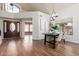 Dining area featuring stylish table, decor, and view to front entry at 2635 N El Dorado Pl, Chandler, AZ 85224
