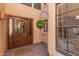 Charming front entryway with decorative door and hanging planter at 2635 N El Dorado Pl, Chandler, AZ 85224