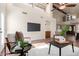 Inviting living room showcasing high ceilings and convenient wet bar at 2635 N El Dorado Pl, Chandler, AZ 85224