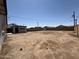 Large, open backyard with detached garage; ideal for landscaping, recreation, and outdoor living at 2745 E Wood St, Phoenix, AZ 85040