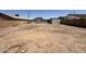 Large backyard featuring a detached structure, offering plenty of space for outdoor activities at 2745 E Wood St, Phoenix, AZ 85040