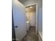 Bathroom entrance features wood-look floors and a vanity at 2745 E Wood St, Phoenix, AZ 85040