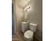 Bathroom with vanity, mirror, light fixture, and toilet at 2745 E Wood St, Phoenix, AZ 85040