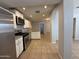 Bright modern kitchen with an archway showing easy access to the living room at 2745 E Wood St, Phoenix, AZ 85040