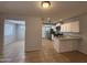 Modern kitchen with granite countertops, stainless steel appliances, and ample cabinet space at 2745 E Wood St, Phoenix, AZ 85040