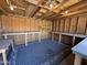 Interior view of a shed featuring wood framing and multiple tables, perfect for a workshop at 2745 E Wood St, Phoenix, AZ 85040