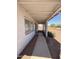 Walkway of a home that has columns and decorative gravel around the structure at 2745 E Wood St, Phoenix, AZ 85040