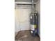 Energy-efficient Rheem water heater with visible performance ratings and utility connections at 2745 E Wood St, Phoenix, AZ 85040