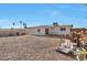 Backyard with gravel and various supplies at 2823 W Banff Ln, Phoenix, AZ 85053