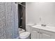 Bathroom with shower/tub combo, modern fixtures, and a stylish vanity at 2823 W Banff Ln, Phoenix, AZ 85053