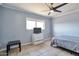 Bedroom with a ceiling fan, neutral paint, and natural light at 2823 W Banff Ln, Phoenix, AZ 85053