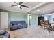 The living room offers lots of space, tile floors and neutral paint at 2823 W Banff Ln, Phoenix, AZ 85053