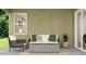 Cozy outdoor patio with comfortable seating and a modern fire pit at 3009 N 97Th Dr, Phoenix, AZ 85037