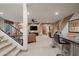 Finished basement features a bar, lounge area, and ample space for recreation at 3119 E Bellflower Dr, Gilbert, AZ 85298