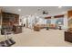 Spacious basement features a kitchenette, a recreation area and a lounge area at 3119 E Bellflower Dr, Gilbert, AZ 85298