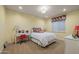 Bright bedroom with desk, white wood furniture, and carpeted floor in a well lit home at 3119 E Bellflower Dr, Gilbert, AZ 85298