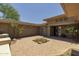 Courtyard of home with paver flooring and decorative desert landscaping at 3119 E Bellflower Dr, Gilbert, AZ 85298