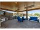 Well-equipped outdoor kitchen featuring a built-in grill, sink, and refrigerator, perfect for summer cookouts at 3119 E Bellflower Dr, Gilbert, AZ 85298