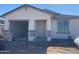 New construction, single story home featuring a covered front entrance and an attached garage at 32016 N Pony Express Rd, San Tan Valley, AZ 85143