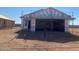 Home under construction, showcasing the framing, and garage with scaffolding in place at 32254 N Pony Express Rd, San Tan Valley, AZ 85143