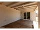 Covered patio with concrete floors and view of fenced backyard at 3408 N 69Th Dr, Phoenix, AZ 85033
