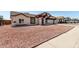 Charming home featuring a well-maintained exterior with a two-car garage and low-maintenance landscaping at 3408 N 69Th Dr, Phoenix, AZ 85033