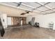 Spacious garage with shelving, storage and concrete floor at 3408 N 69Th Dr, Phoenix, AZ 85033