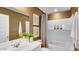 Modern bathroom featuring sleek fixtures, stylish vanity, and contemporary design elements at 36600 W Maddaloni Ave, Maricopa, AZ 85138