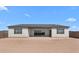 Backyard with a large lot and covered patio, perfect for outdoor entertaining at 37695 W Santa Maria St, Maricopa, AZ 85138