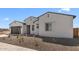 Beautiful single-story home featuring desert landscaping, and a convenient two-car garage at 37695 W Santa Maria St, Maricopa, AZ 85138