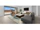 Bright living room featuring stylish furnishings, neutral tones, and sliding glass doors to the backyard at 37695 W Santa Maria St, Maricopa, AZ 85138