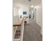 Hallway features neutral walls and carpet leading to several bedrooms at 3871 W Linda Ln, Chandler, AZ 85226