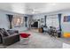 Open living area with a view of the backyard and a dedicated workspace at 3871 W Linda Ln, Chandler, AZ 85226