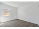 Bedroom featuring neutral carpeting and a large window for natural light at 40015 W Venture Rd, Maricopa, AZ 85138