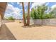 Large backyard with low maintenance desert landscaping, mature trees, and privacy fence offers plenty of room at 4226 W Evans Dr, Phoenix, AZ 85053