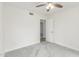 This bright bedroom features neutral walls, soft carpet, and a walk-in closet at 4226 W Evans Dr, Phoenix, AZ 85053