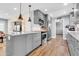 Kitchen with gray cabinets, stainless steel appliances, and granite counters at 4363 E Dragoon Cir, Mesa, AZ 85206