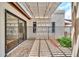 Back patio has tiled flooring and a pergola covered area at 4601 E Carolina Dr, Phoenix, AZ 85032