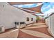 This home has a spacious backyard area with shade awning at 4601 E Carolina Dr, Phoenix, AZ 85032