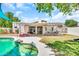 Backyard features a pool, patio, and pergola, perfect for outdoor enjoyment at 4601 E Carolina Dr, Phoenix, AZ 85032