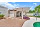 Backyard with stone landscaping, a pergola covered patio and pool at 4601 E Carolina Dr, Phoenix, AZ 85032