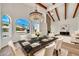 Stunning dining room featuring a large marble table, chandelier, and elegant seating at 4601 E Carolina Dr, Phoenix, AZ 85032