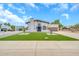 Stunning two-story home boasts charming curb appeal with a well-manicured lawn and elegant facade at 4601 E Carolina Dr, Phoenix, AZ 85032