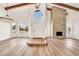 Elegant foyer with arched windows and fireplace at 4601 E Carolina Dr, Phoenix, AZ 85032